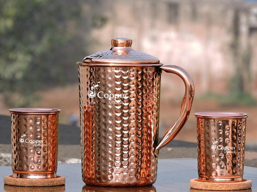 copper jug with two tumblers